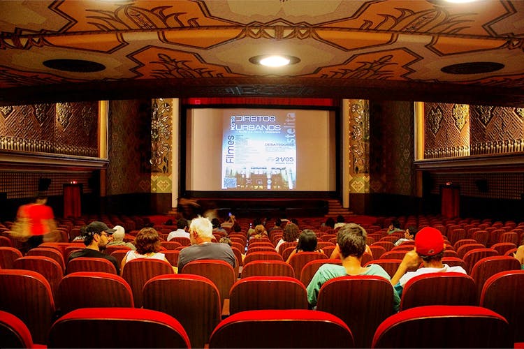 Projection screen,Auditorium,Convention,Academic conference,Theatre,Audience,Event,Conference hall,Movie theater,heater