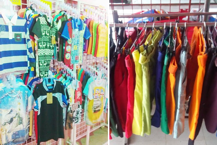Clothing,Clothes hanger,Boutique,Room,Dress,Outlet store,Bazaar,Textile,T-shirt,Fashion design