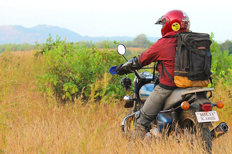 Vehicle,Grass,Grassland,Adventure,Safari,Recreation,Rural area,Motorcycle,All-terrain vehicle,Soil