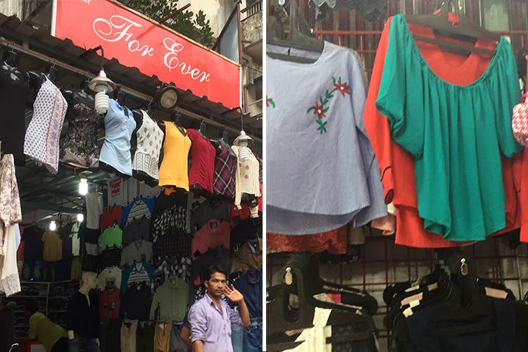 Clothing,T-shirt,Textile,Shirt,Boutique,Bazaar,Top,City,Sleeve