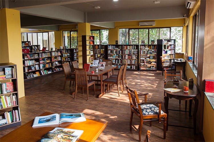 Library,Public library,Bookselling,Building,Bookcase,Retail,Room,Book,Shelving,Furniture