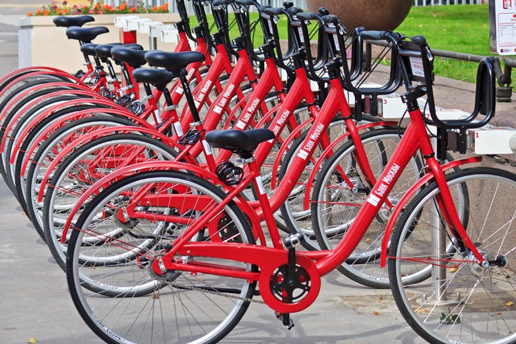 Land vehicle,Bicycle,Bicycle wheel,Vehicle,Bicycle part,Bicycle handlebar,Bicycle frame,Red,Bicycle saddle,Bicycle tire