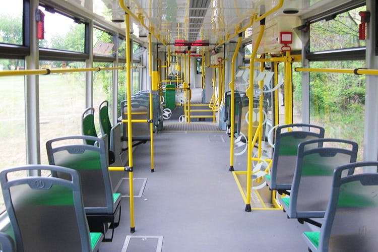 Transport,Bus,Vehicle,Aisle,Public transport,Room,Trolleybus,Tram,Interior design,Building