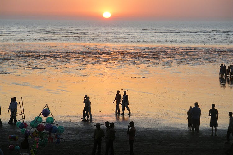 People on beach,Sky,Horizon,Beach,Sea,Sunset,Ocean,Sunrise,Sun,Evening
