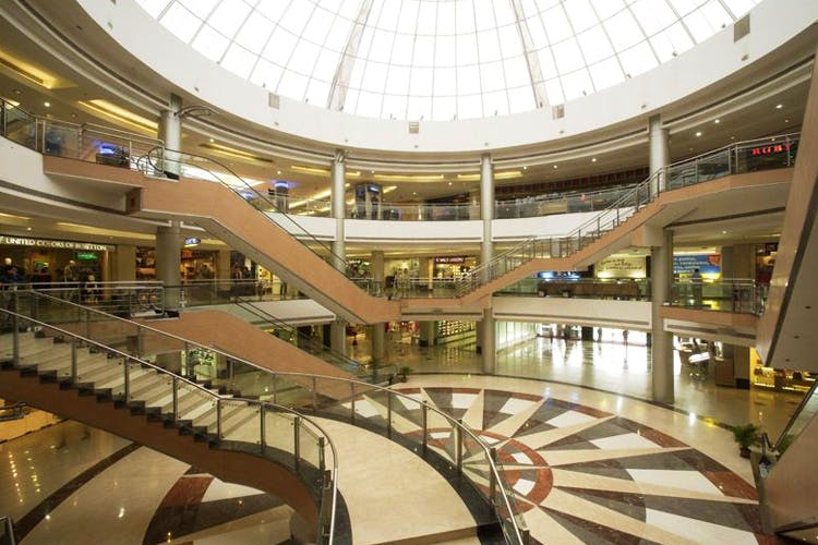 Shopping mall,Building,Architecture,Retail,Lobby,Mixed-use,Shopping,Stairs,Daylighting,Interior design