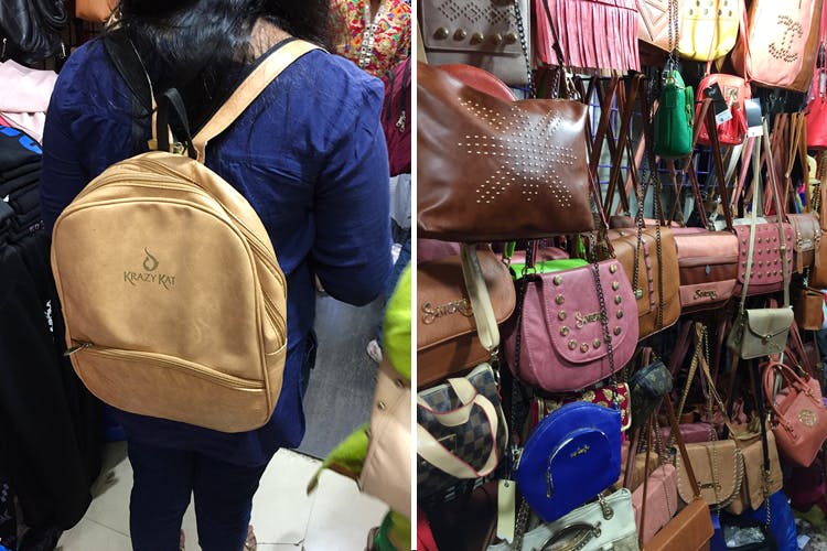 Selling,Bag,Shoulder,Public space,Market,Fashion accessory,Luggage and bags,Bazaar,Textile,Handbag