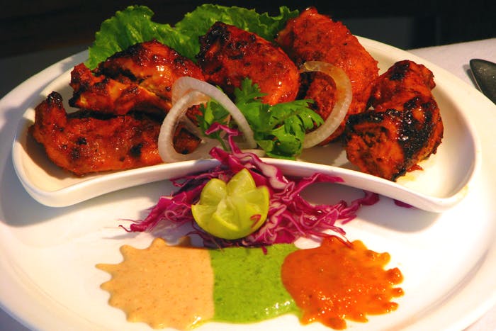 Dish,Food,Cuisine,Ingredient,Tandoori chicken,Chicken 65,Chicken tikka,Meat,Produce,Garnish