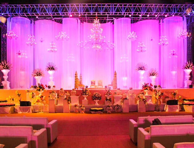 Decoration,Stage,Theatrical scenery,Lighting,Function hall,Music venue,Theatre,Purple,heater,Event