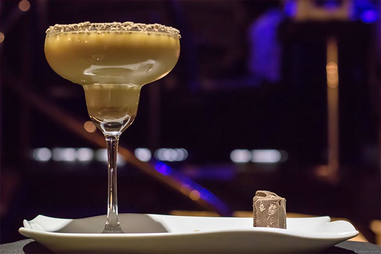 Drink,Classic cocktail,Alcoholic beverage,Champagne cocktail,Champagne stemware,Distilled beverage,Cocktail,Drinkware,Daiquiri,Margarita