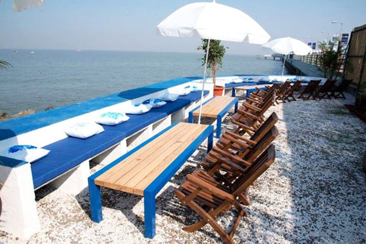 Furniture,Table,Outdoor furniture,Picnic table,Resort,Sea,Vacation,Sunlounger,Outdoor table,Bench