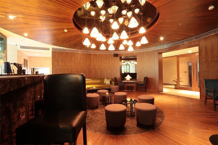 Building,Room,Interior design,Property,Lighting,Ceiling,Lobby,Furniture,Architecture,House