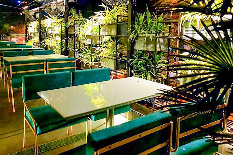 Green,Table,Furniture,Restaurant,Room,Building,Architecture,Leisure,Interior design,Plant