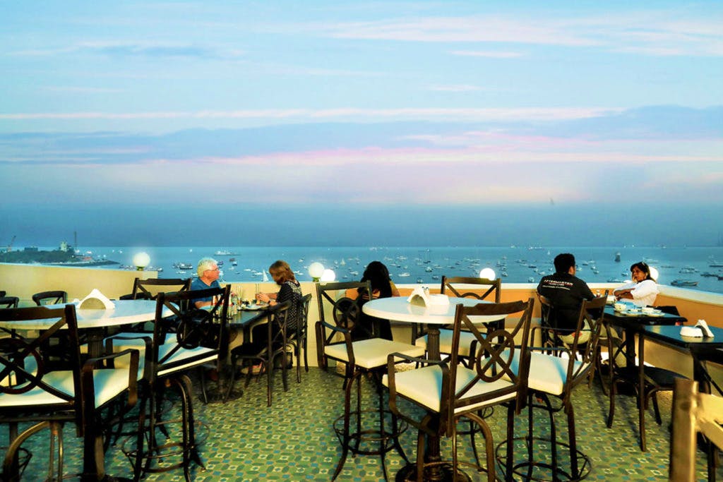 Restaurant,Sea,Resort,Table,Tourism,Sky,Vacation,Beach,Room,Ocean
