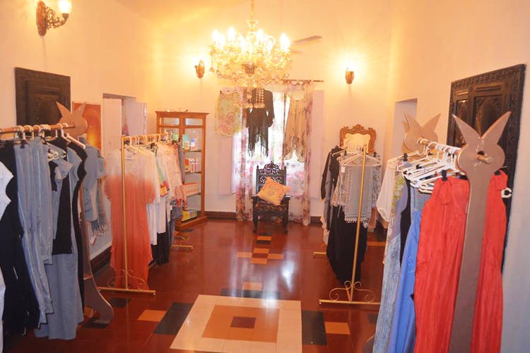 Boutique,Room,Dress,Furniture,Costume design,Interior design