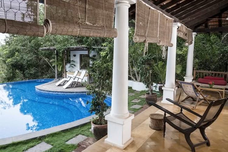 Property,Swimming pool,Building,Resort,House,Real estate,Villa,Leisure,Backyard,Room