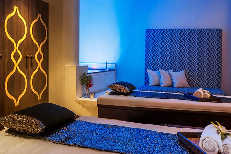 Furniture,Room,Bedroom,Blue,Bed,Majorelle blue,Interior design,Wall,Bed sheet,Bed frame