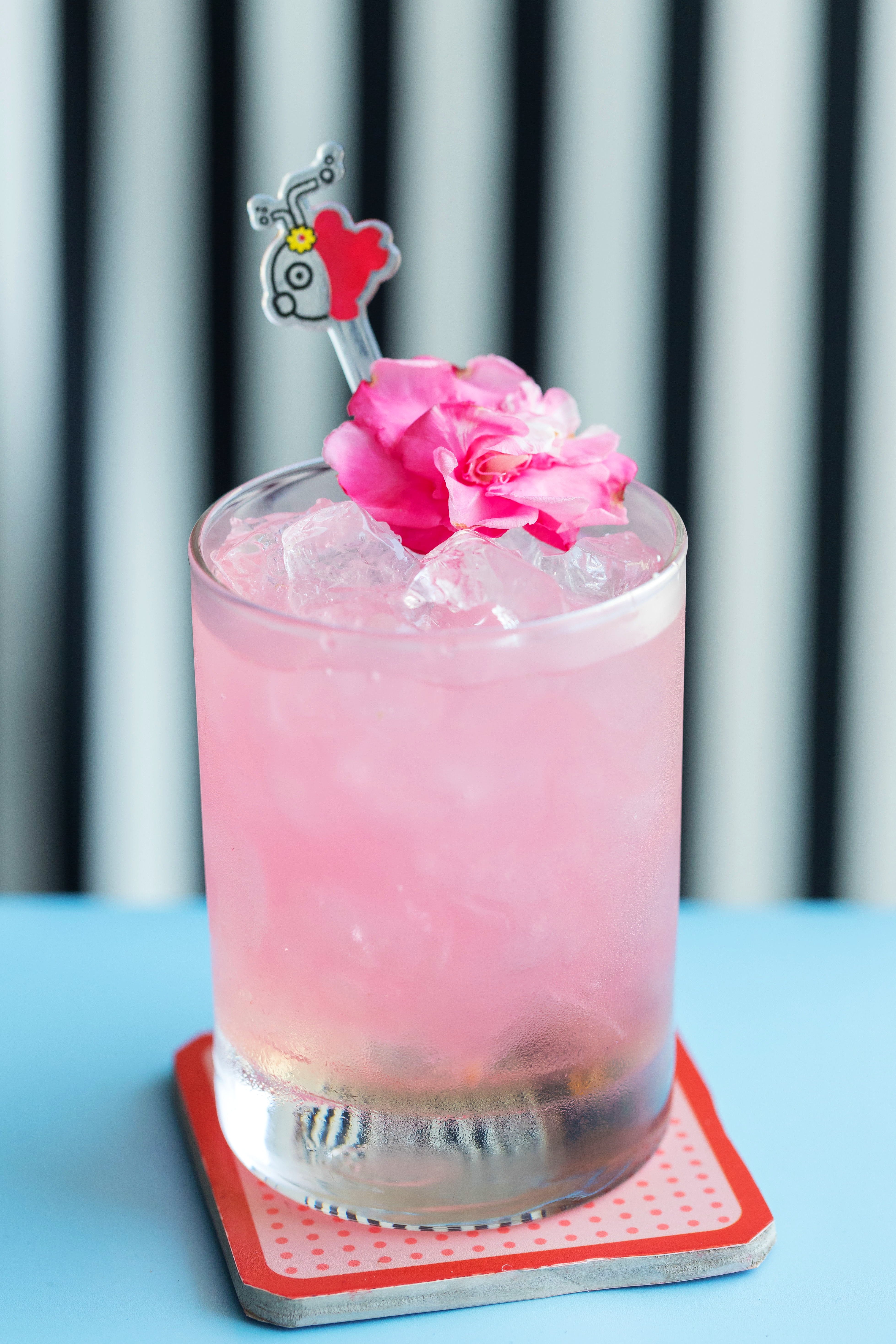 Drink,Non-alcoholic beverage,Pink,Italian soda,Cocktail,Food,Alcoholic beverage,Rose,Pink lady,Cocktail garnish